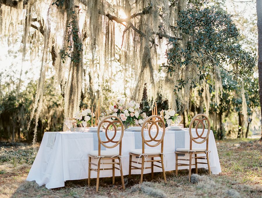 Long table of low centerpieces